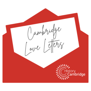 Red envelope with words "Cambridge Love Letters" written on white paper coming out of envelope