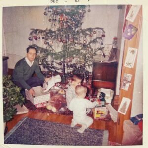 John Fenerlis with the young Louis and Peter on Christmas morning of 1963. 