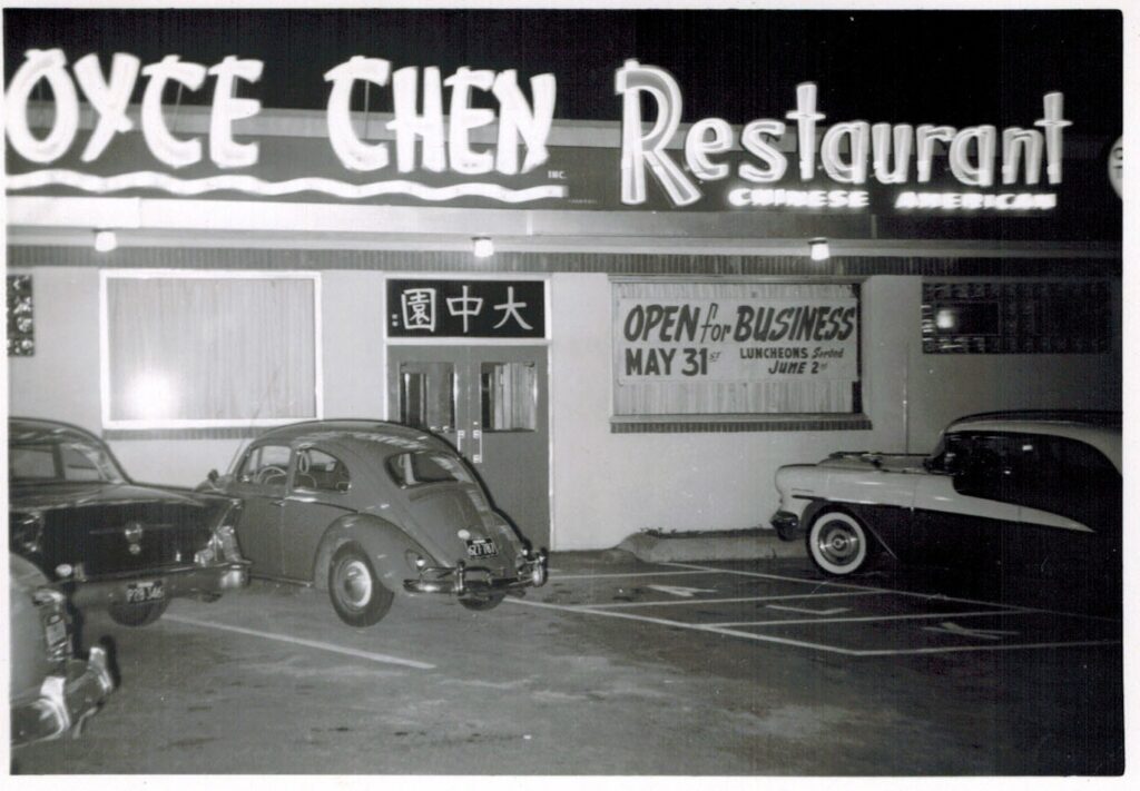 One story building with cars parked out front. Sign reads Joyce Chen Restaurant