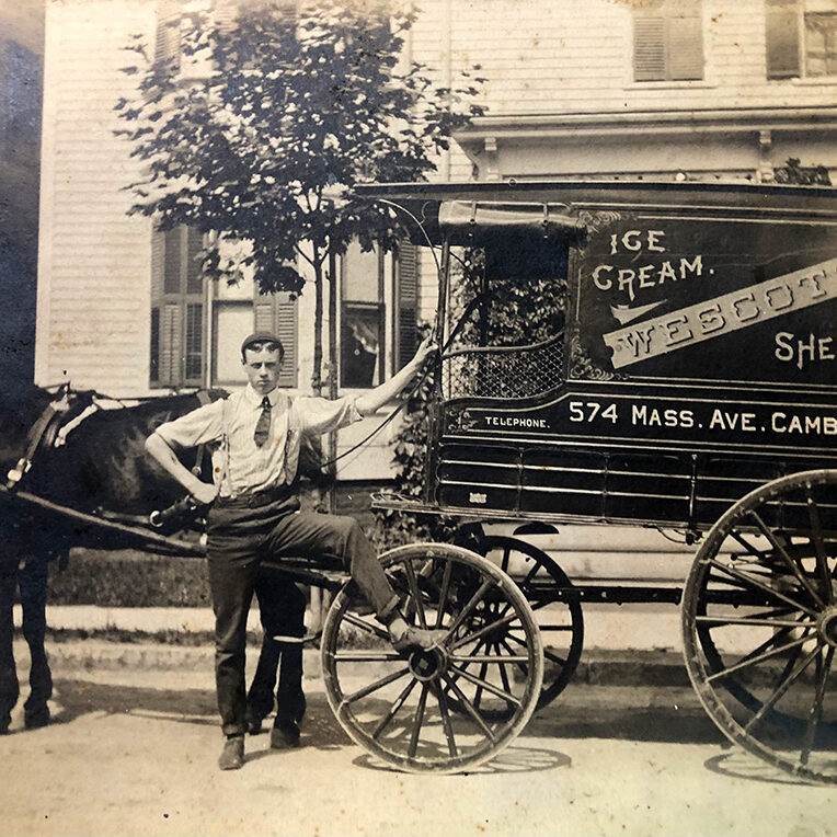 A driver poses with his horse and ice cream cart in Cambridge in 1902.