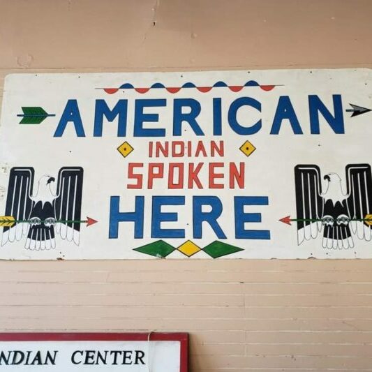 A banner at the North American Indian Center of Boston is by Sage Carbone.