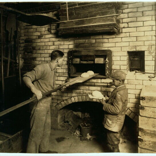 Vincenzo (age 15) and Angelo
(age 11) Messina working at their
father’s bakery at 174 Salem Street,
Boston (February 1917).
Photograph by Lewis Wickes Hine;
Library of Congress